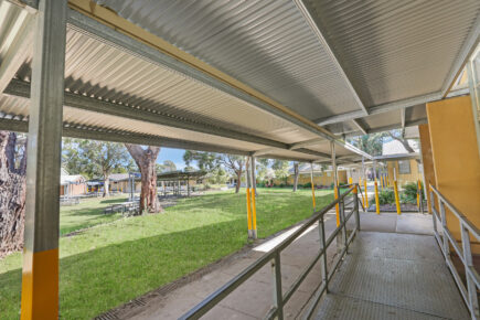 Covered walkway leading to school buildings