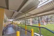 Accessible ramp with handrails at Australian school walkway