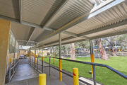 Accessible ramp with handrails at Australian school walkway