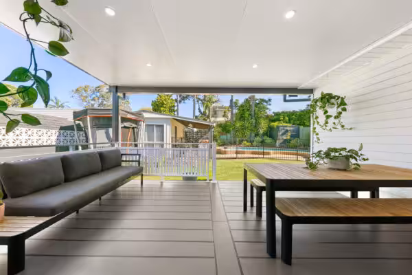 insulated patio with brown and grey furniture